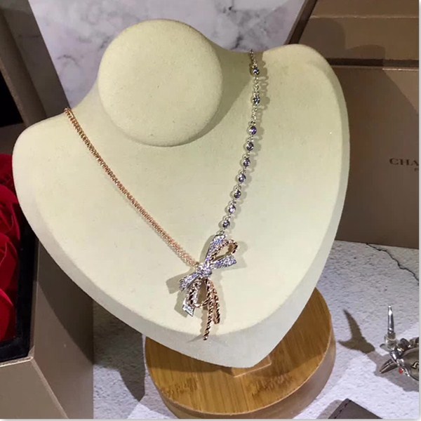 replica,repliche,fake,1:1,earrings,bracelet,ring,jewelry Collana con fiocco CHAUMET