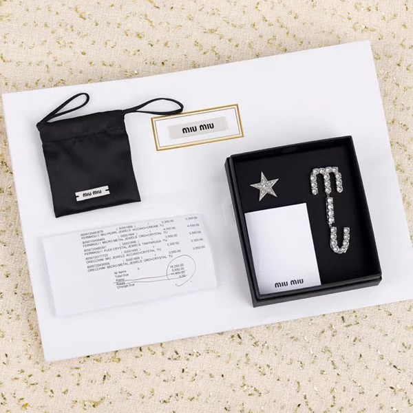 replica,repliche,fake,1:1,earrings,bracelet,ring,jewelry Orecchini pentagramma asimmetrici MiuMiu