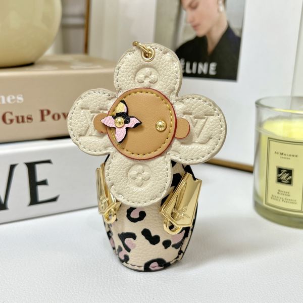 replica,repliche,fake,1:1,earrings,bracelet,ring,jewelry Portachiavi bambola Louis Vuitton Girasole/MP3069