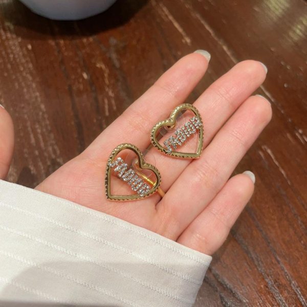Orecchini Dior di seconda mano