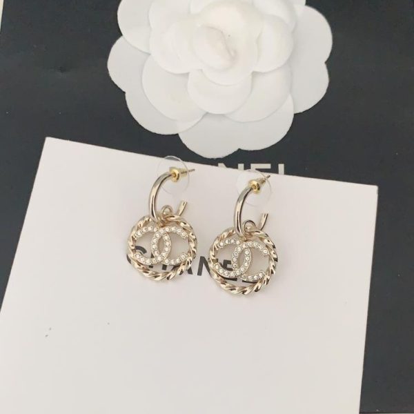 Ganci per le orecchie cc rotondi cavi Chanel