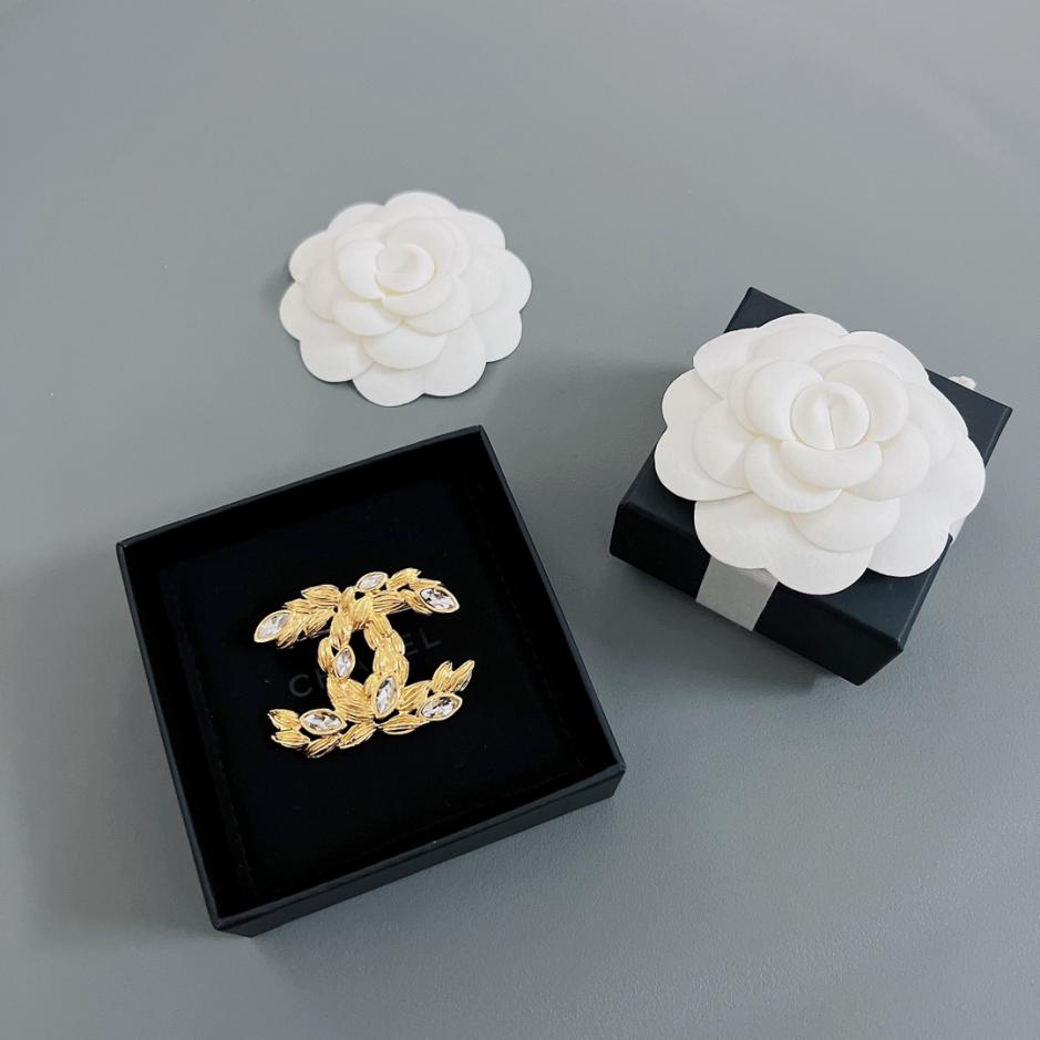 replica,repliche,fake,1:1,earrings,bracelet,ring,jewelry Spilla Chanel con orecchio di grano dorato profumato replica,repliche,fake,1:1,earrings,bracelet,ring,jewelry Spilla Chanel con orecchio di grano dorato profumato