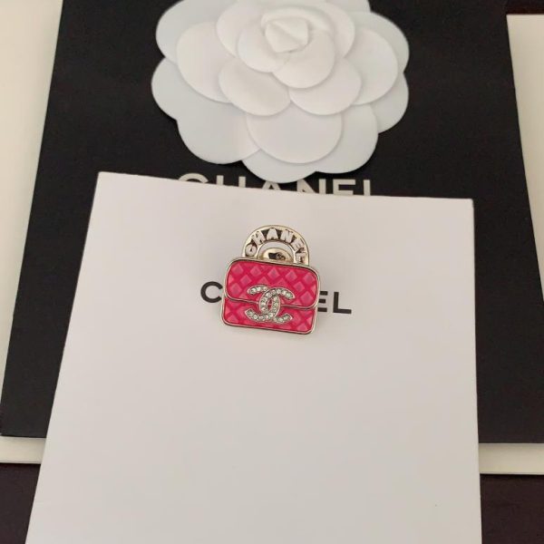 replica,repliche,fake,1:1,earrings,bracelet,ring,jewelry Spilla per borsa rosa Chanel