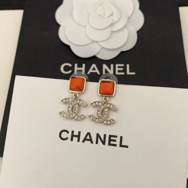 Orecchini cc Chanel in resina marrone