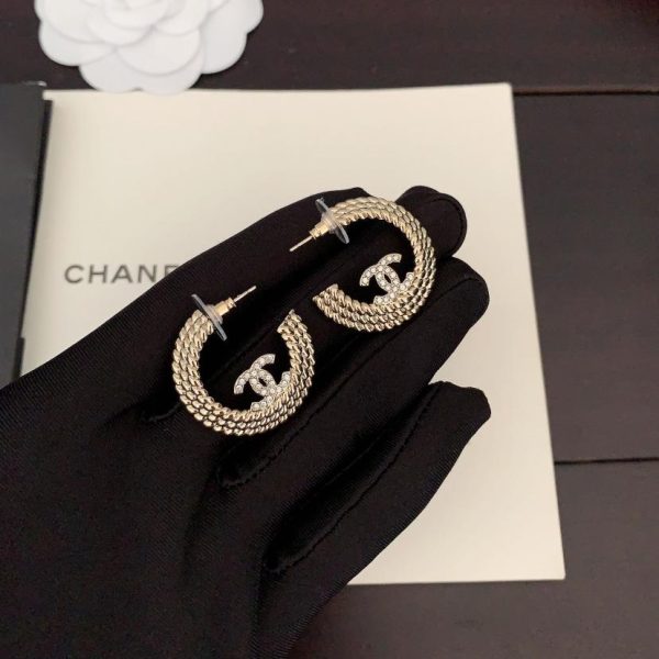 Ganci per le orecchie cc a strisce Chanel