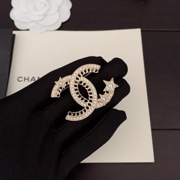 replica,repliche,fake,1:1,earrings,bracelet,ring,jewelry Spilla Chanel stella a cinque punte cc
