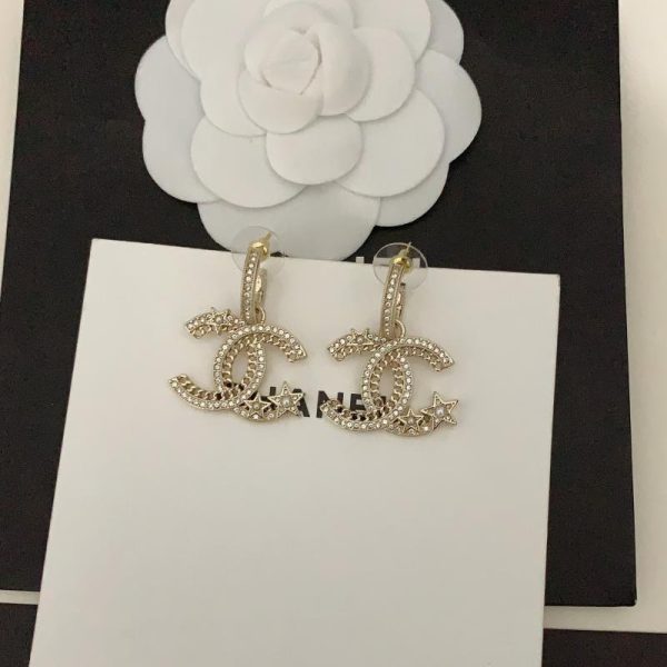 Ganci per orecchie Chanel con stella a cinque punte cc