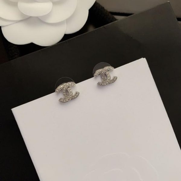 Orecchini Chanel mini in argento con diamanti