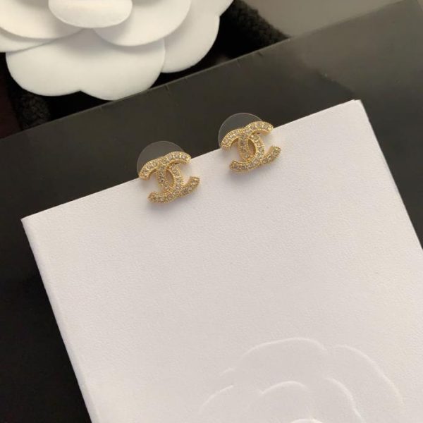 Orecchini a bottone Chanel mini in oro con diamanti