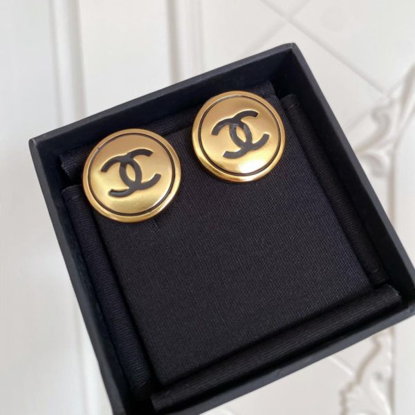 Orecchini rotondi neri oro Chanel