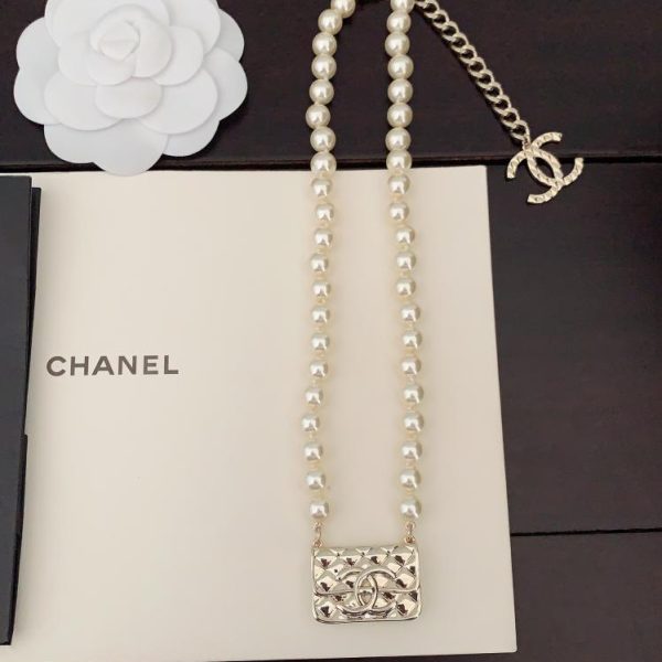 replica,repliche,fake,1:1,earrings,bracelet,ring,jewelry Collana di perle borsa Chanel in oro chiaro