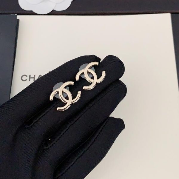 Orecchini Chanel cc in oro chiaro