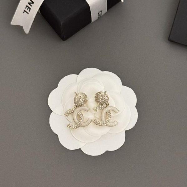 Orecchini Chanel star cc materiale zp coerente