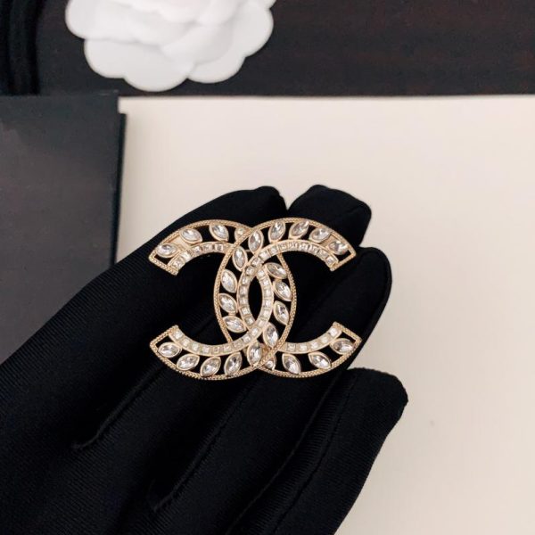 replica,repliche,fake,1:1,earrings,bracelet,ring,jewelry Spilla Chanel vuota cc