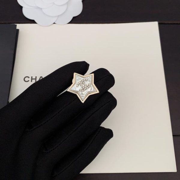 replica,repliche,fake,1:1,earrings,bracelet,ring,jewelry Spilla Chanel stella bianca a cinque punte
