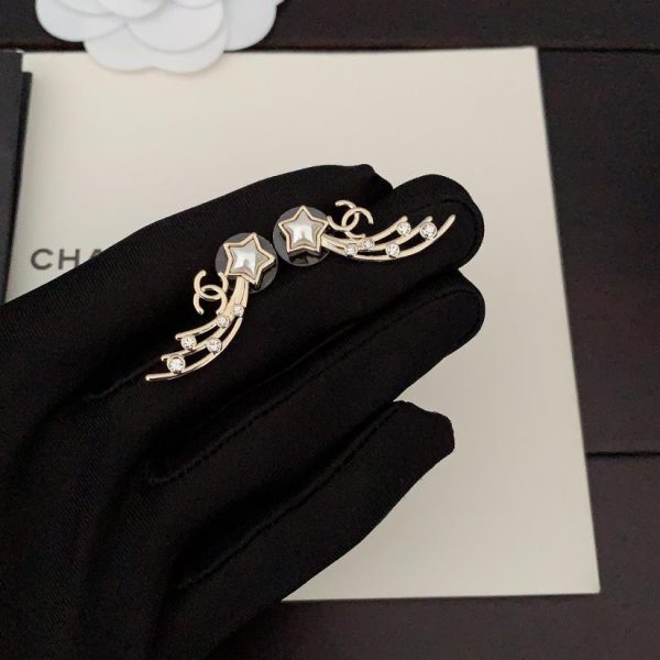 Orecchini Chanel stella bianca a cinque punte