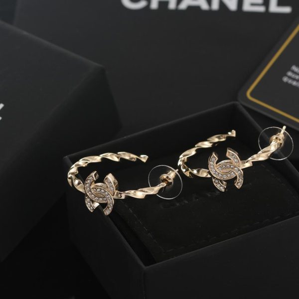 replica,repliche,fake,1:1,earrings,bracelet,ring,jewelry Orecchini Chanel in oro chiaro