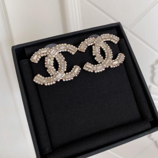 Orecchini lunghi doppia C Chanel 22k