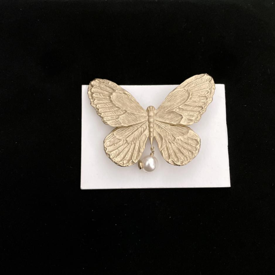 replica,repliche,fake,1:1,earrings,bracelet,ring,jewelry Fermaglio per capelli a farfalla Chanel replica,repliche,fake,1:1,earrings,bracelet,ring,jewelry Fermaglio per capelli a farfalla Chanel