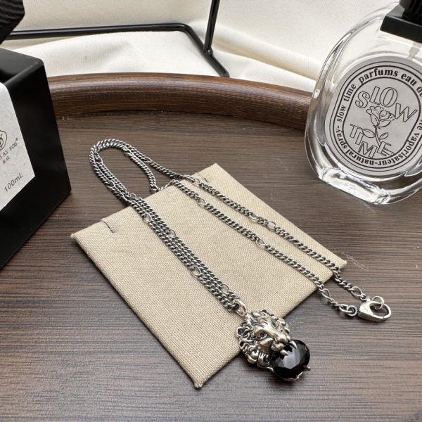 replica,repliche,fake,1:1,earrings,bracelet,ring,jewelry Collana Gucci in pietra con testa di leone