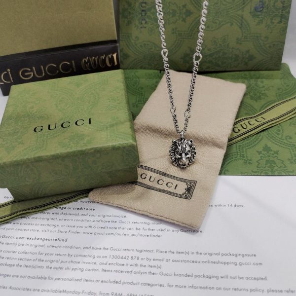 replica,repliche,fake,1:1,earrings,bracelet,ring,jewelry Ciondolo testa di leone Gucci