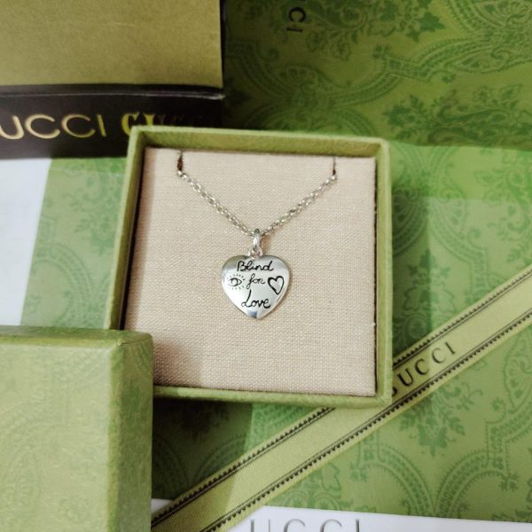 replica,repliche,fake,1:1,earrings,bracelet,ring,jewelry Collana Gucci con pendente a cuore