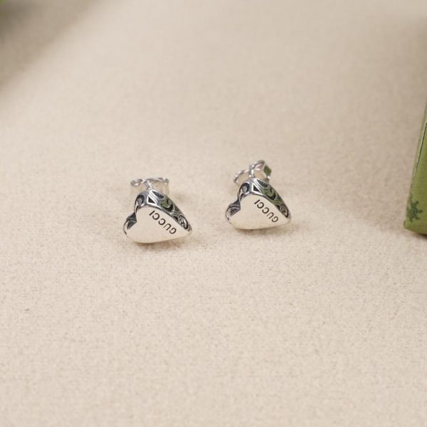 replica,repliche,fake,1:1,earrings,bracelet,ring,jewelry Orecchini in argento con pendente doppia g love Gucci