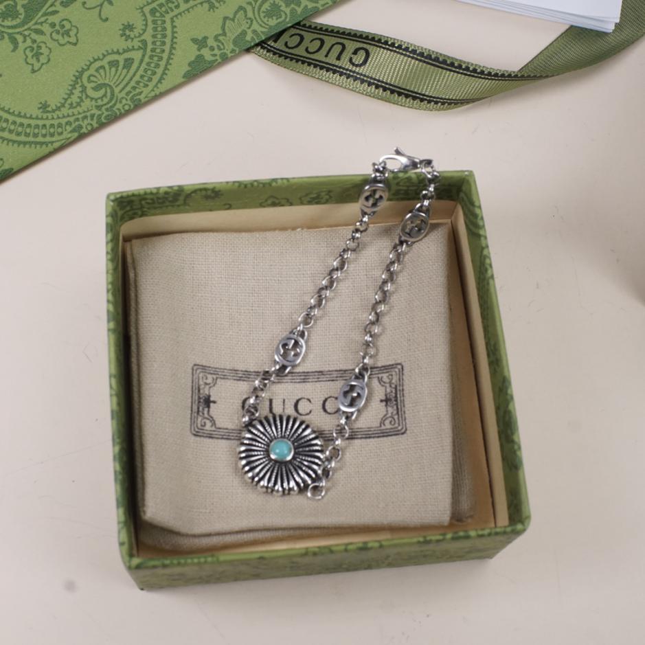 replica,repliche,fake,1:1,earrings,bracelet,ring,jewelry Bracciale Gucci doppia G intrecciata con margherita turchese replica,repliche,fake,1:1,earrings,bracelet,ring,jewelry Bracciale Gucci doppia G intrecciata con margherita turchese