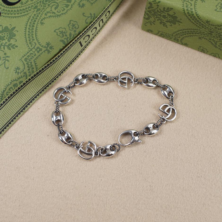 replica,repliche,fake,1:1,earrings,bracelet,ring,jewelry Bracciale Gucci con ancoraggio a doppia G intrecciata con naso di maiale replica,repliche,fake,1:1,earrings,bracelet,ring,jewelry Bracciale Gucci con ancoraggio a doppia G intrecciata con naso di maiale