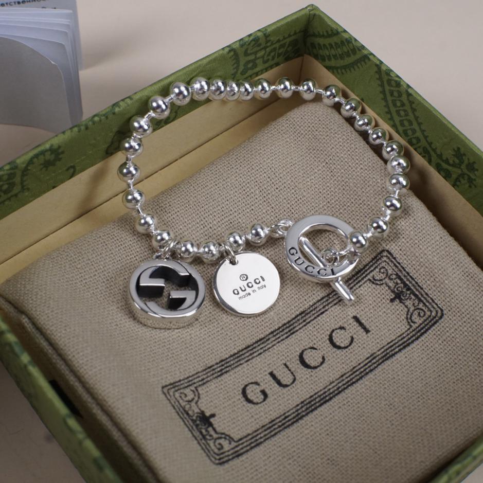 replica,repliche,fake,1:1,earrings,bracelet,ring,jewelry Bracciale Gucci con fibbia a medaglione intrecciata con doppia G replica,repliche,fake,1:1,earrings,bracelet,ring,jewelry Bracciale Gucci con fibbia a medaglione intrecciata con doppia G