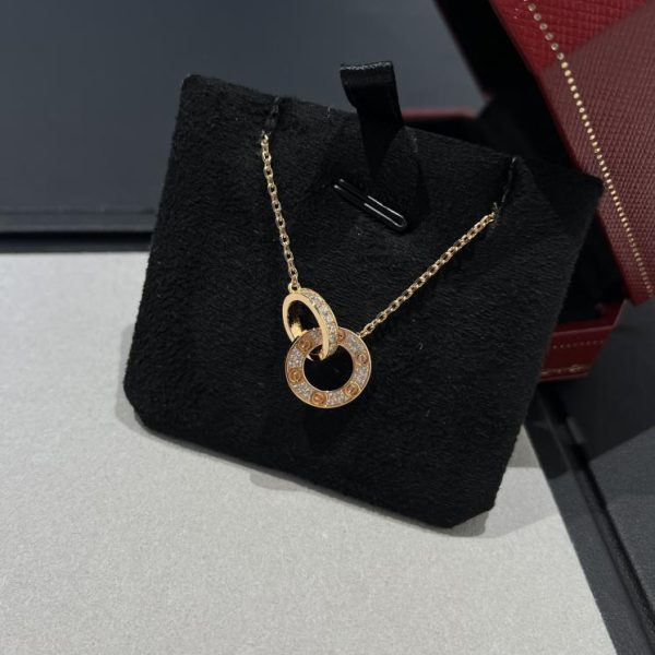 Collana torta con doppio anello di diamanti Cartier