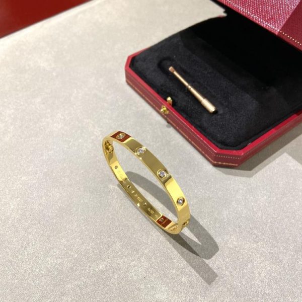replica,repliche,fake,1:1,earrings,bracelet,ring,jewelry Bracciale Cartier con dieci diamanti versione ampia