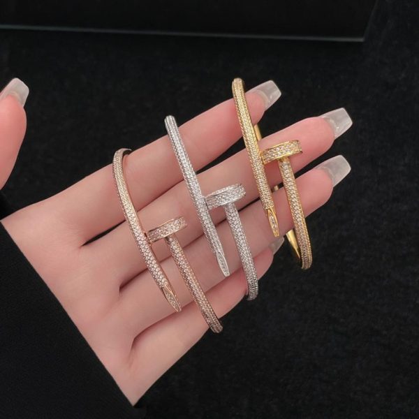 replica,repliche,fake,1:1,earrings,bracelet,ring,jewelry Bracciale con unghie Cartier interamente in diamanti