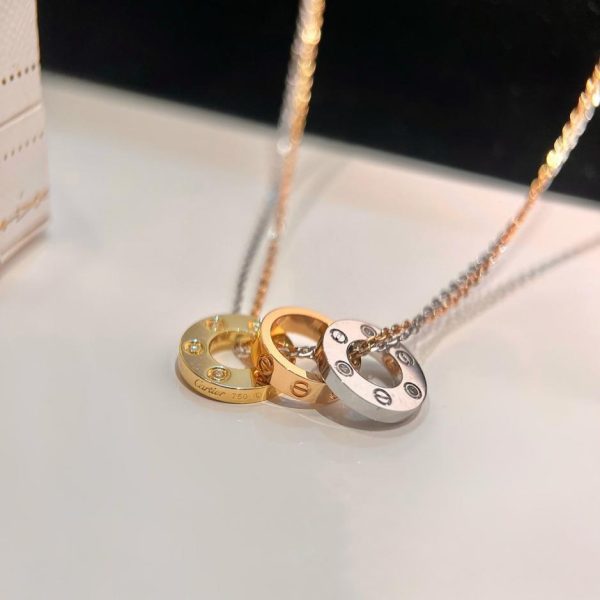 replica,repliche,fake,1:1,earrings,bracelet,ring,jewelry Collana con combinazione di tre torte di Cartier