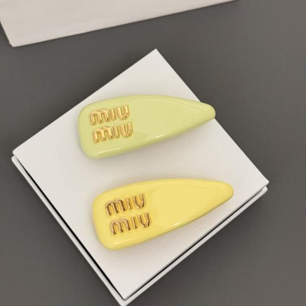 replica,repliche,fake,1:1,earrings,bracelet,ring,jewelry Fermaglio per capelli a forma di caramella Miu Miu