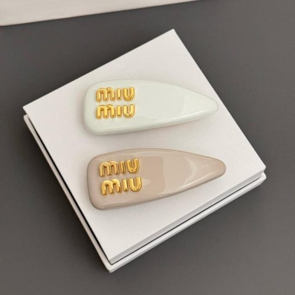 replica,repliche,fake,1:1,earrings,bracelet,ring,jewelry Fermaglio per capelli a forma di caramella Miu Miu