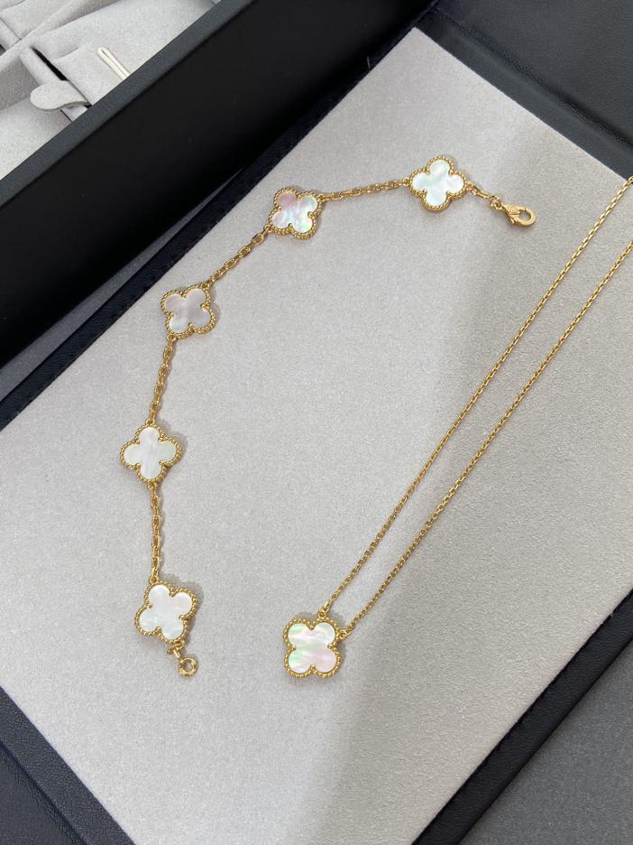 replica,repliche,fake,1:1,earrings,bracelet,ring,jewelry [Versione top] Bracciale e collana a cinque fiori in madreperla bianca e oro di Van Cleef & Arpels