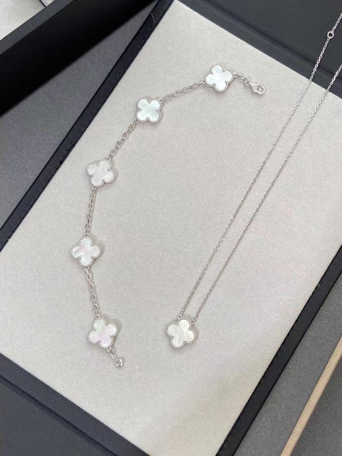 replica,repliche,fake,1:1,earrings,bracelet,ring,jewelry [Versione top] Bracciale e collana a cinque fiori di Van Cleef & Arpels in oro bianco e madreperla bianca