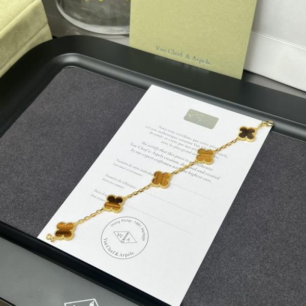 replica,repliche,fake,1:1,earrings,bracelet,ring,jewelry [Versione top] Bracciale con cinque fiori in occhio di tigre di Van Cleef & Arpels