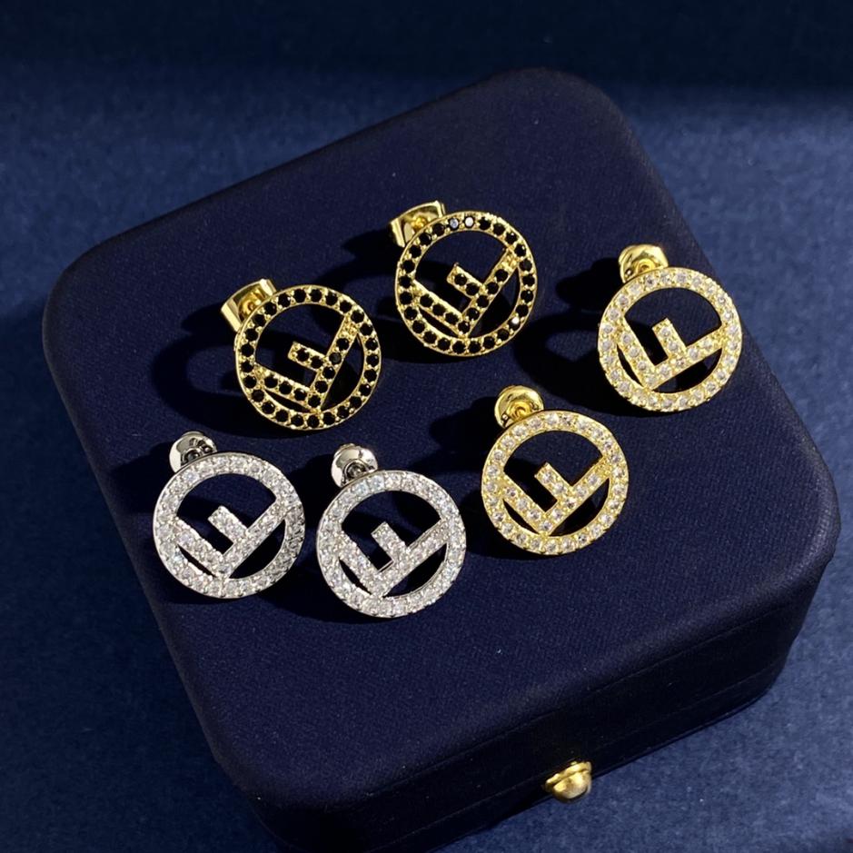 replica,repliche,fake,1:1,earrings,bracelet,ring,jewelry Orecchini a bottone F Fendi con diamanti vuoti e pieni