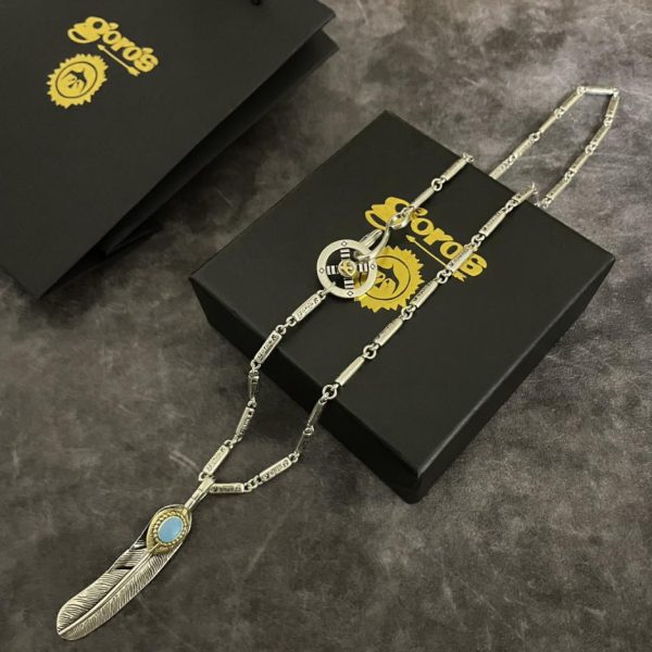 replica,repliche,fake,1:1,earrings,bracelet,ring,jewelry [Versione top] Ciondolo con piume Goro Takahashi di Goro Collana classica con lettere in bambù Takahashi
