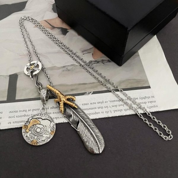 replica,repliche,fake,1:1,earrings,bracelet,ring,jewelry [Versione top] Collana con doppio pendente in piuma Goro Takahashi di Goro
