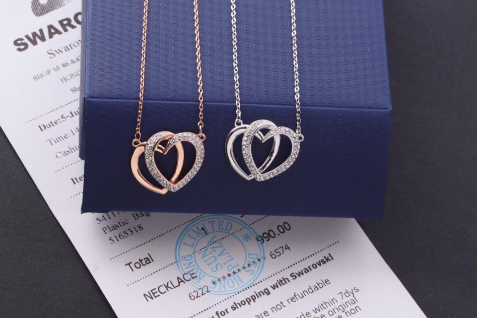 replica,repliche,fake,1:1,earrings,bracelet,ring,jewelry Collana Swarovski con clavicola a doppio cuore