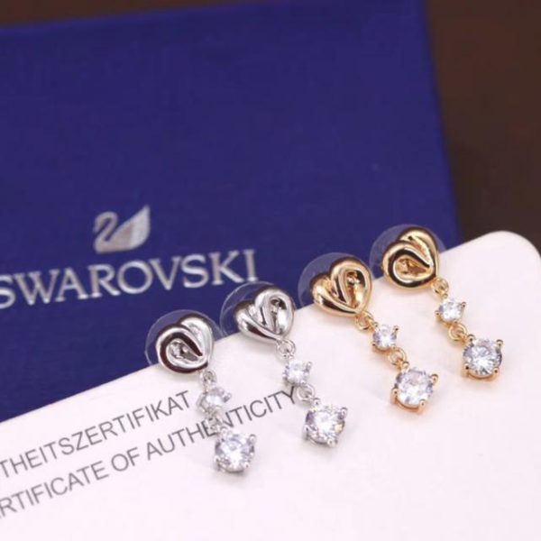 replica,repliche,fake,1:1,earrings,bracelet,ring,jewelry Orecchini nodo d’amore Swarovski