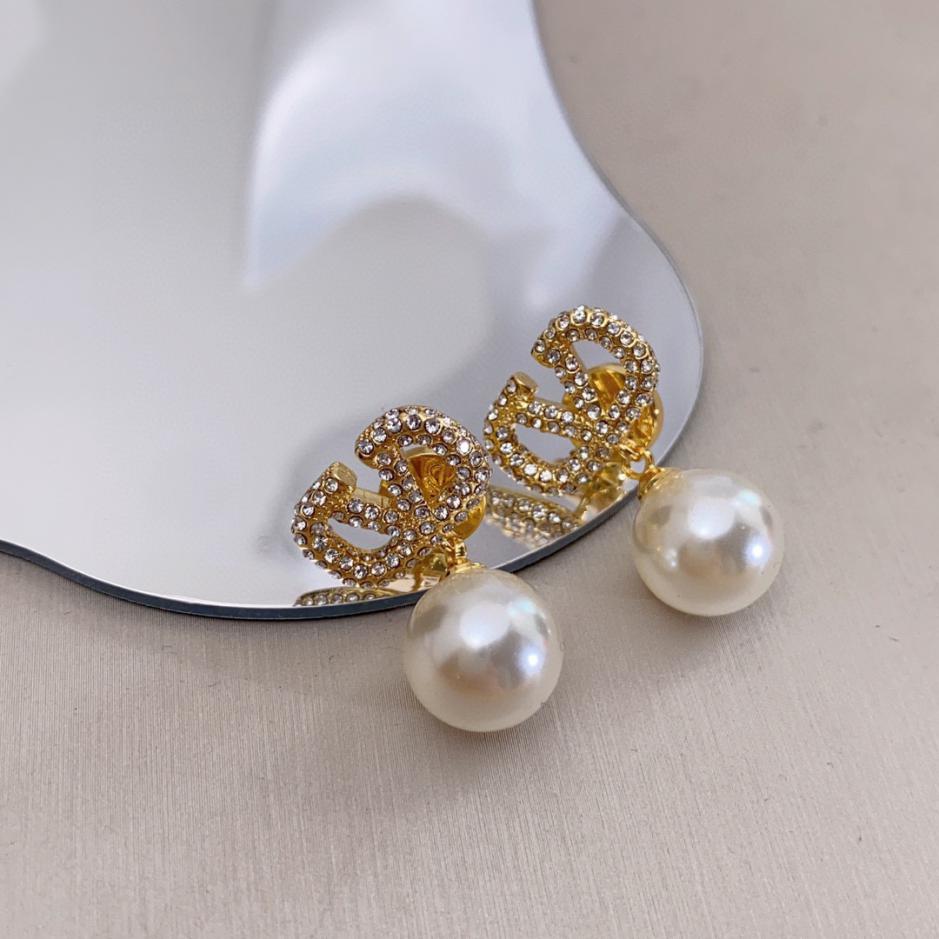 replica,repliche,fake,1:1,earrings,bracelet,ring,jewelry Orecchini da banco Valentino