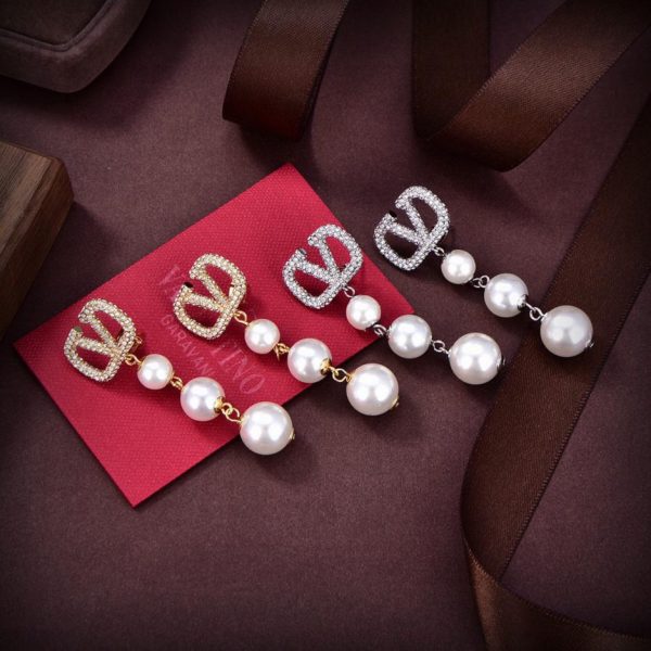 replica,repliche,fake,1:1,earrings,bracelet,ring,jewelry Orecchini Valentino con diamanti pieni
