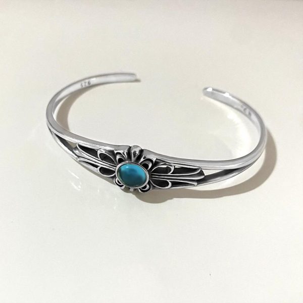 Bracciale aperto con croce di cuori cromati
