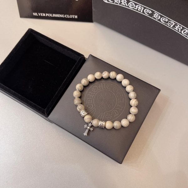replica,repliche,fake,1:1,earrings,bracelet,ring,jewelry Bracciale naturale con cuori cromati
