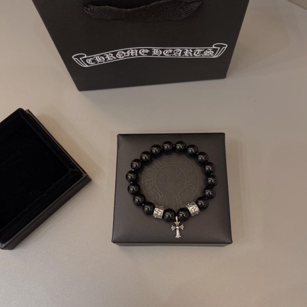 Bracciale naturale con cuori cromati