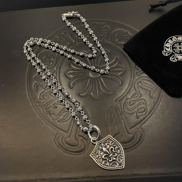 replica,repliche,fake,1:1,earrings,bracelet,ring,jewelry Collana con sfere incrociate vintage con cuori cromati